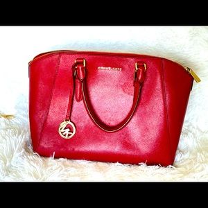 Michael Kors red handbag. Almost tote size.